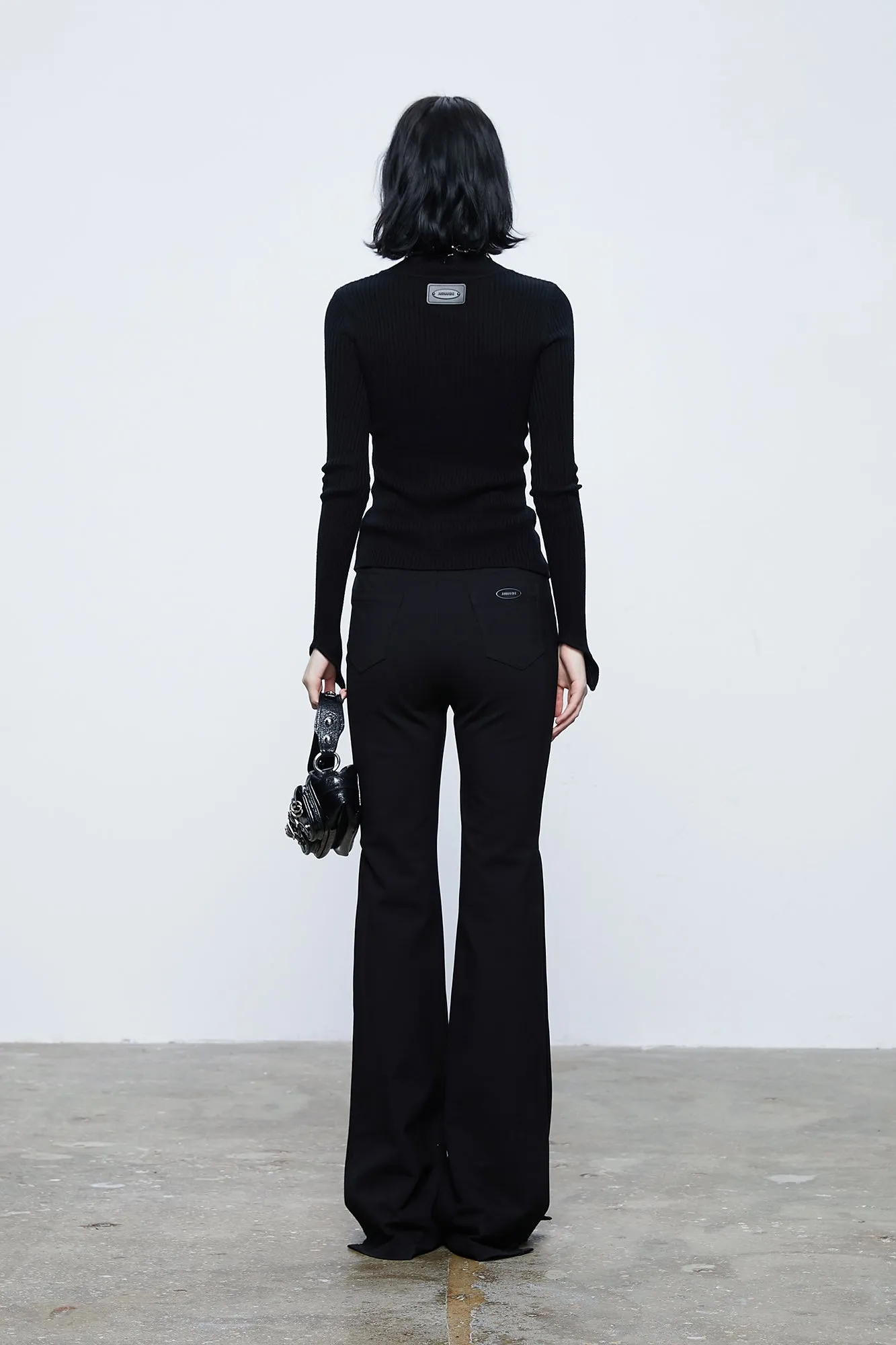 Side pleated slim flared trousers